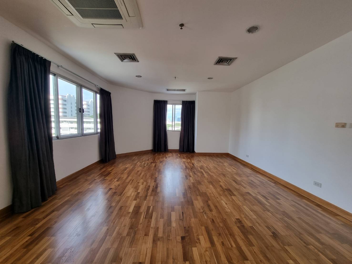 Spacious 3-bedrooms 3-bathrooms condo at Baan Suan Plu with 295 sqm, private residence, green garden, and premium amenities for rent at 135,000 THB/month.