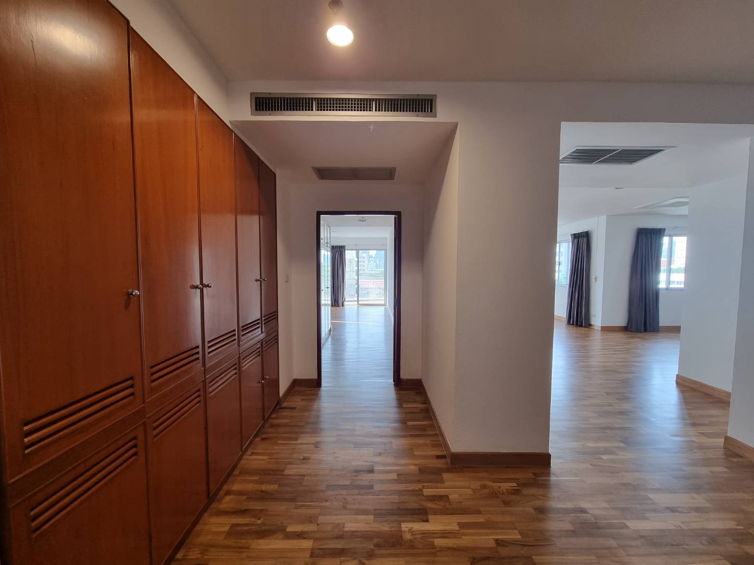 Spacious 3-bedrooms 3-bathrooms condo at Baan Suan Plu with 295 sqm, private residence, green garden, and premium amenities for rent at 135,000 THB/month.