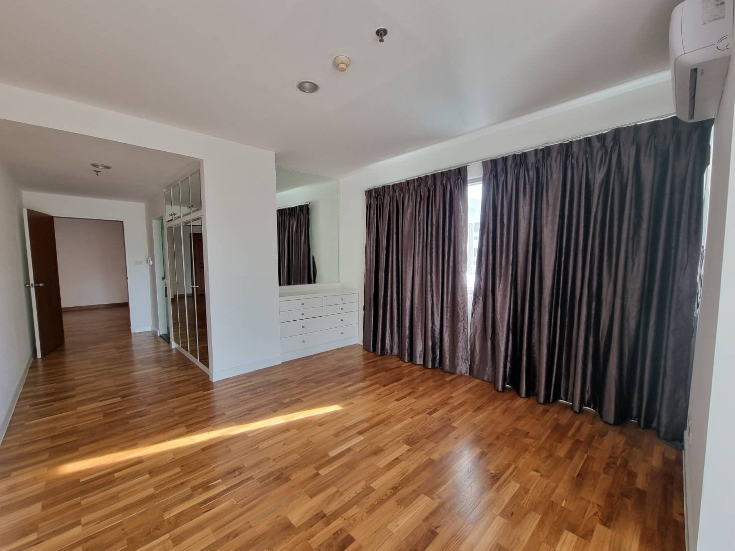 Spacious 3-bedrooms 3-bathrooms condo at Baan Suan Plu with 295 sqm, private residence, green garden, and premium amenities for rent at 135,000 THB/month.