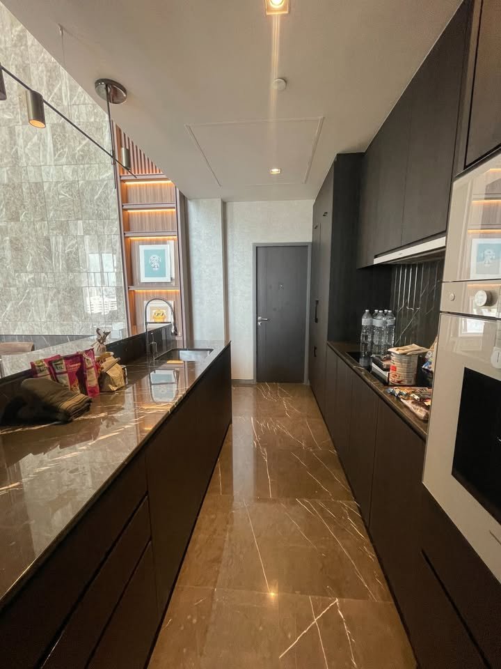Luxury 2-bedroom 3-bathroom 220 sqm condo at Crystal Garden for sale in Sathorn. High floor, open views, concierge, lap pool, and tennis court.