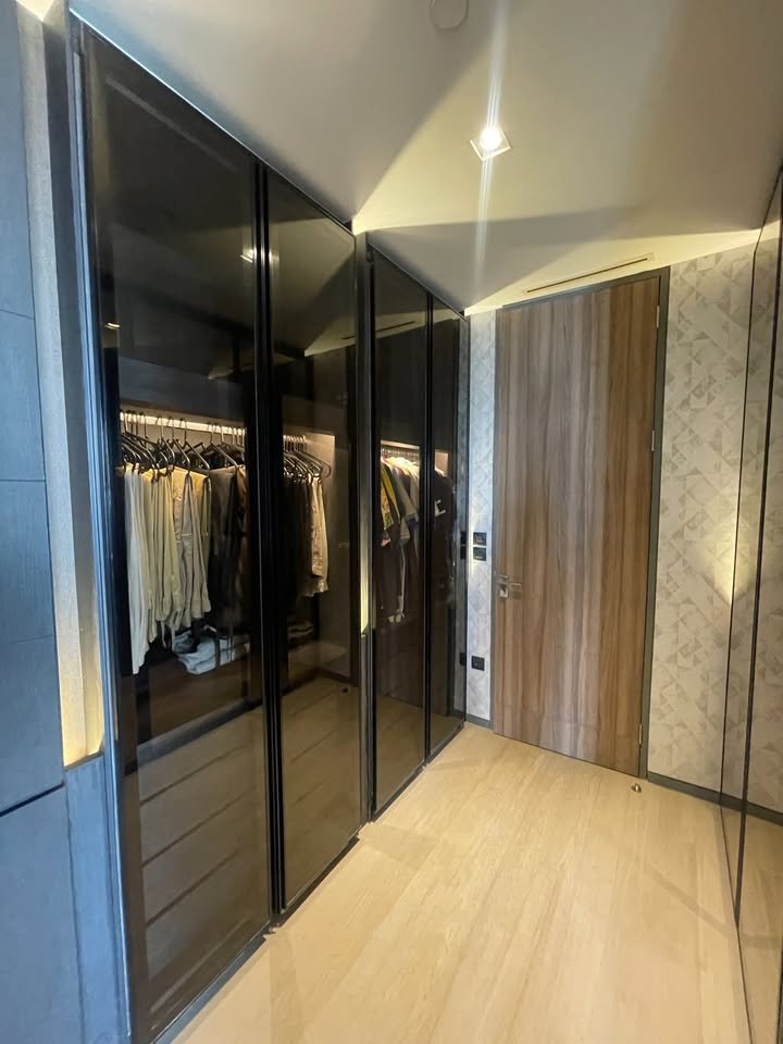 Luxury 2-bedroom 3-bathroom 220 sqm condo at Crystal Garden for sale in Sathorn. High floor, open views, concierge, lap pool, and tennis court.