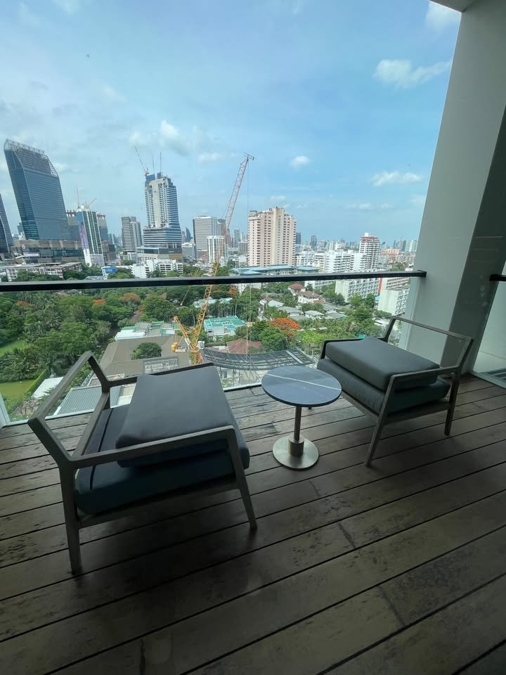 Luxury 2-bedroom 3-bathroom 220 sqm condo at Crystal Garden for sale in Sathorn. High floor, open views, concierge, lap pool, and tennis court.