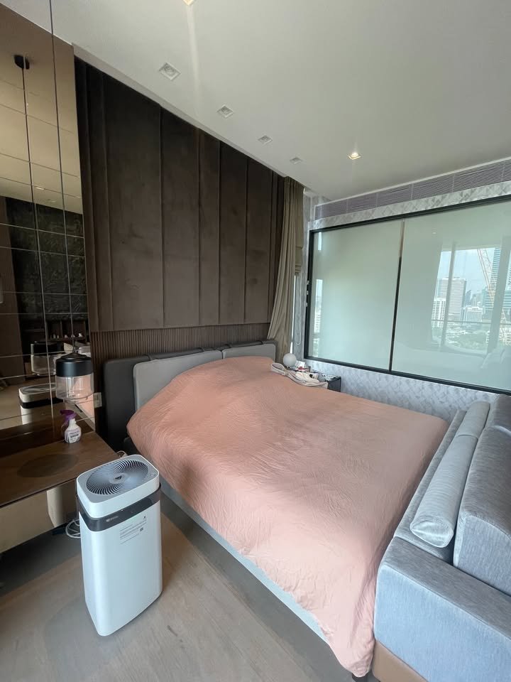 Luxury 2-bedroom 3-bathroom 220 sqm condo at Crystal Garden for sale in Sathorn. High floor, open views, concierge, lap pool, and tennis court.