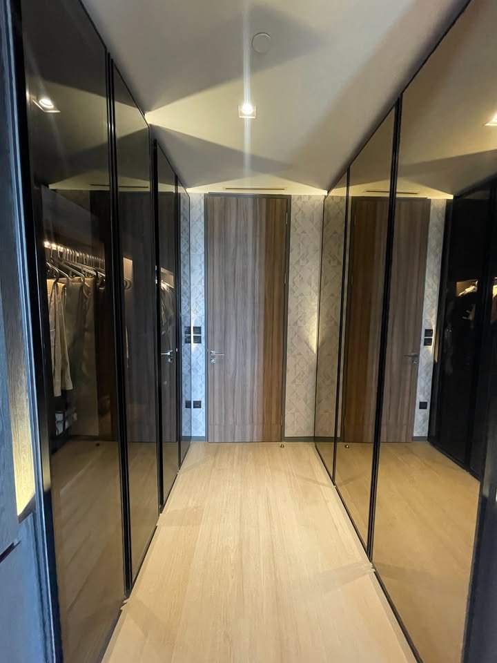 Luxury 2-bedroom 3-bathroom 220 sqm condo at Crystal Garden for sale in Sathorn. High floor, open views, concierge, lap pool, and tennis court.
