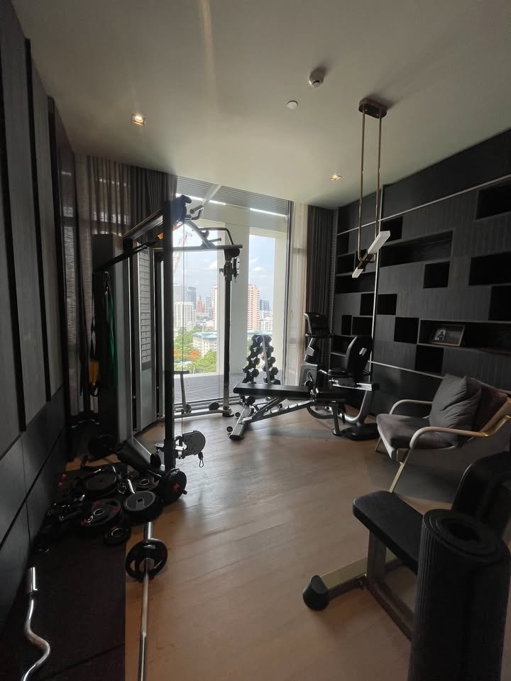 Luxury 2-bedroom 3-bathroom 220 sqm condo at Crystal Garden for sale in Sathorn. High floor, open views, concierge, lap pool, and tennis court.
