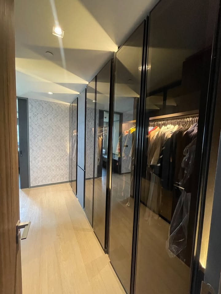 Luxury 2-bedroom 3-bathroom 220 sqm condo at Crystal Garden for sale in Sathorn. High floor, open views, concierge, lap pool, and tennis court.