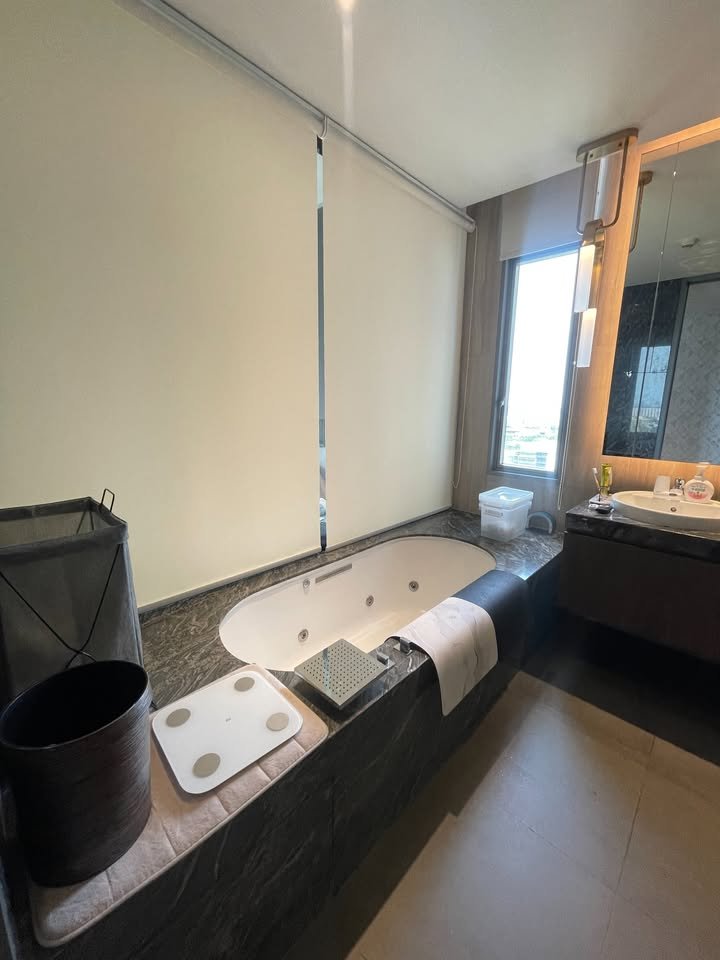 Luxury 2-bedroom 3-bathroom 220 sqm condo at Crystal Garden for sale in Sathorn. High floor, open views, concierge, lap pool, and tennis court.
