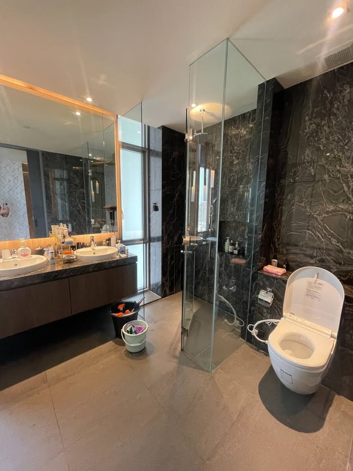 Luxury 2-bedroom 3-bathroom 220 sqm condo at Crystal Garden for sale in Sathorn. High floor, open views, concierge, lap pool, and tennis court.
