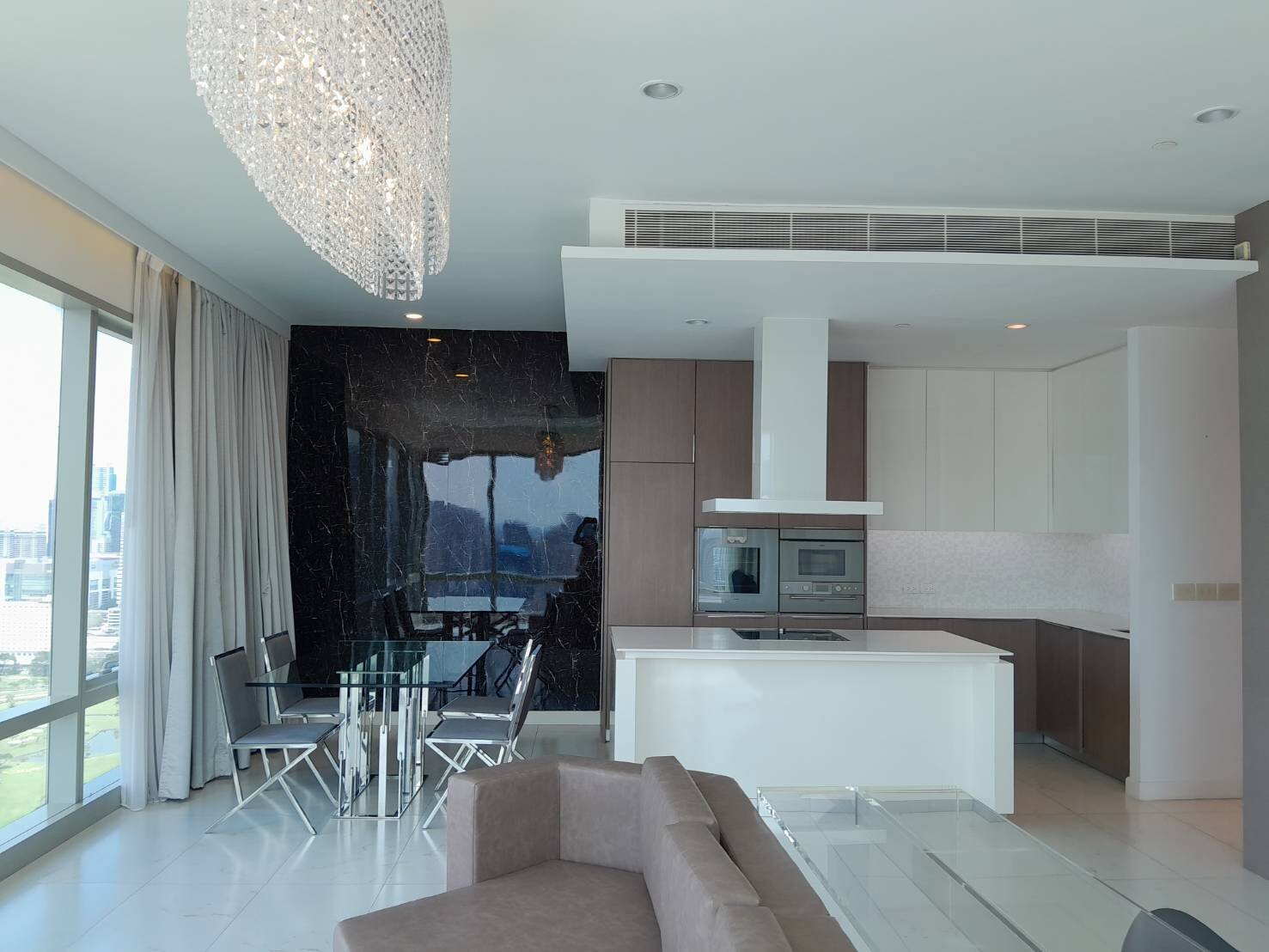 Luxury 2-bedroom 2-bathroom 173.52 sqm penthouse at 185 Rajadamri for rent. High floor, open views, concierge, pool, gym, and library.