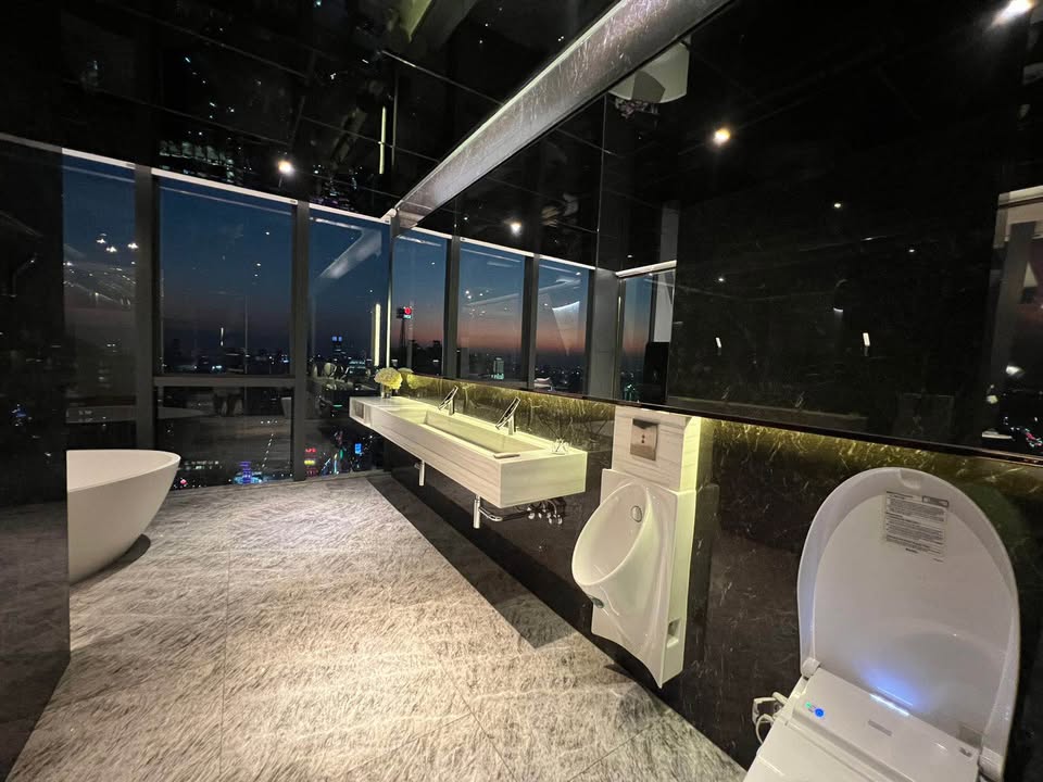 Luxury 3-bed 4-bath 297 sqm condo at MARQUE Sukhumvit with private pool, maid's room, and 4 parking spaces for rent at 700,000 THB monthly near Phrom Phong BTS.