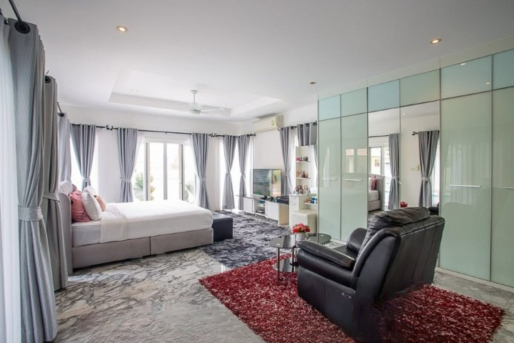 Luxurious 3-bedroom pool villa in Orchid Palm Homes, Hua Hin Soi 88. Fully furnished with private pool and garden. Price: 13,900,000 THB.