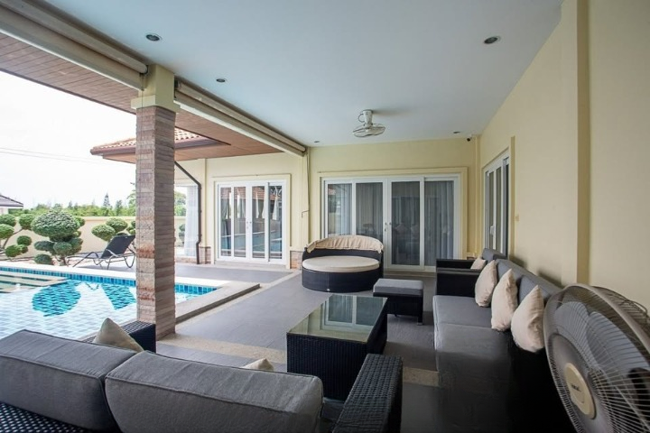 Luxurious 3-bedroom pool villa in Orchid Palm Homes, Hua Hin Soi 88. Fully furnished with private pool and garden. Price: 13,900,000 THB.