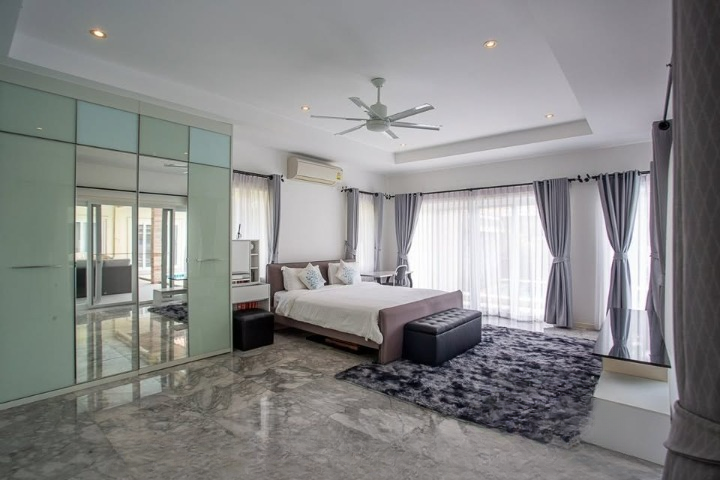 Luxurious 3-bedroom pool villa in Orchid Palm Homes, Hua Hin Soi 88. Fully furnished with private pool and garden. Price: 13,900,000 THB.