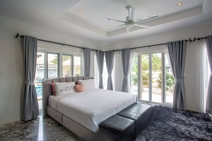Luxurious 3-bedroom pool villa in Orchid Palm Homes, Hua Hin Soi 88. Fully furnished with private pool and garden. Price: 13,900,000 THB.