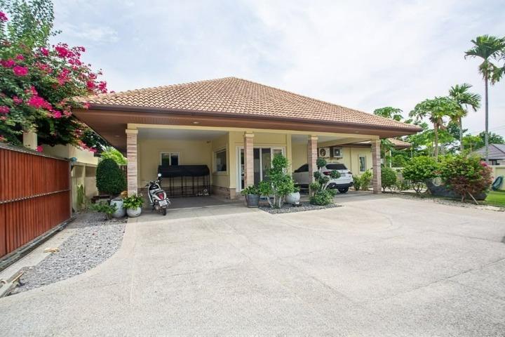 Luxurious 3-bedroom pool villa in Orchid Palm Homes, Hua Hin Soi 88. Fully furnished with private pool and garden. Price: 13,900,000 THB.