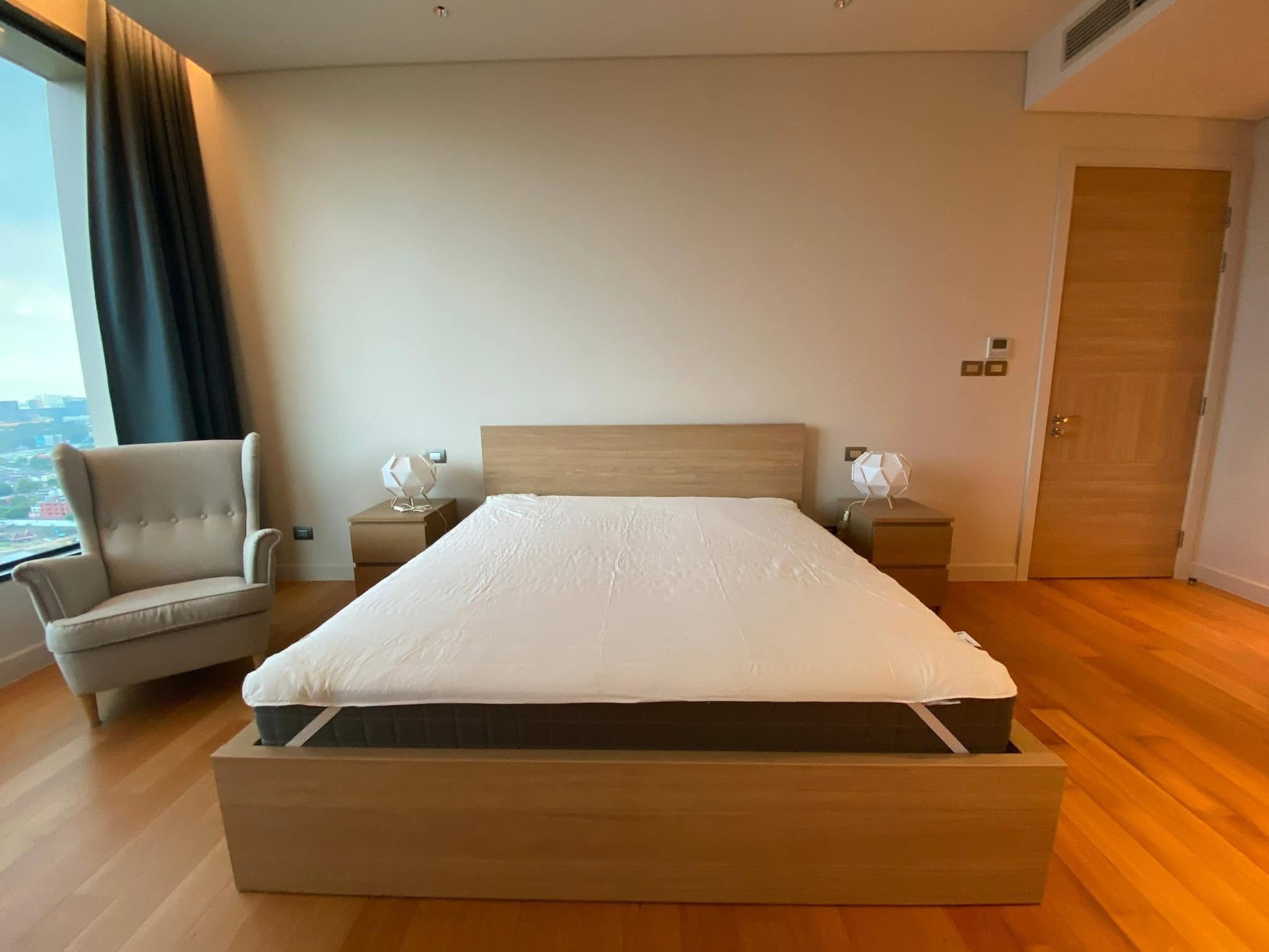 2-Bedrooms 2-Bathrooms 114 sqm condo at Sindhorn Residence for Rent 125,000 THB/Month or For Sale 28.9M THB. Prime Langsuan location, 3m ceilings, garden views.