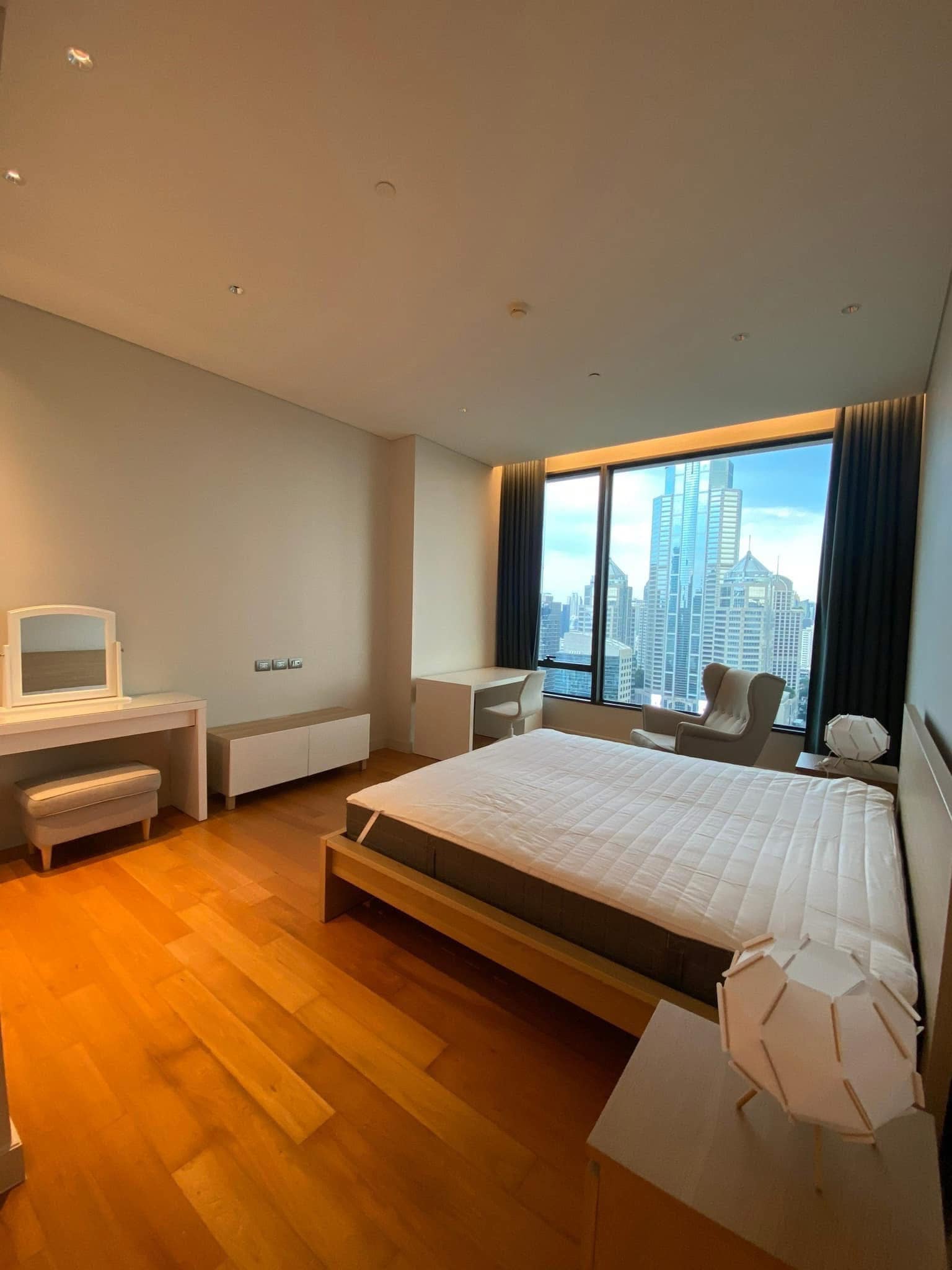 2-Bedrooms 2-Bathrooms 114 sqm condo at Sindhorn Residence for Rent 125,000 THB/Month or For Sale 28.9M THB. Prime Langsuan location, 3m ceilings, garden views.