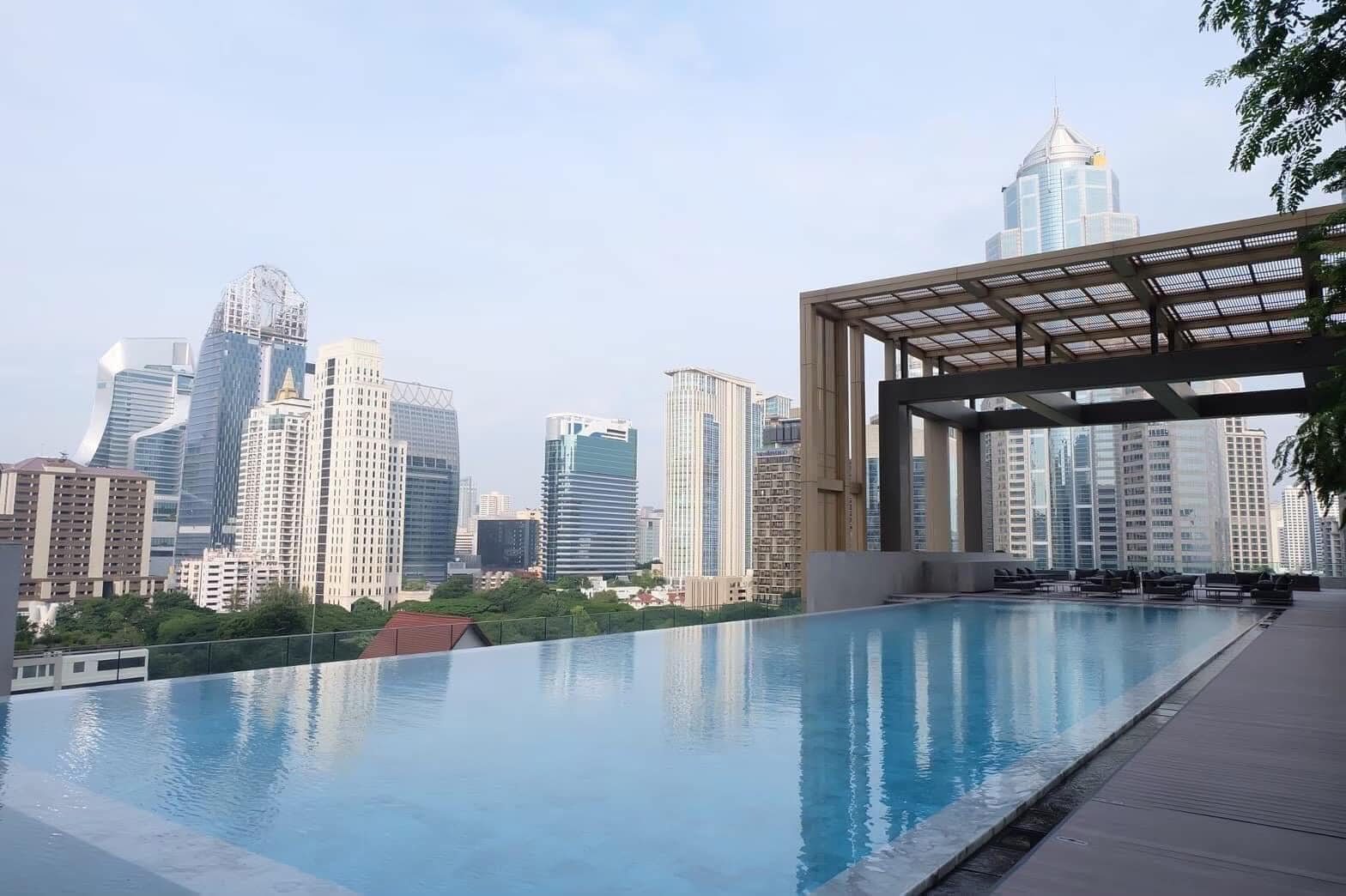 2-Bedrooms 2-Bathrooms 114 sqm condo at Sindhorn Residence for Rent 125,000 THB/Month or For Sale 28.9M THB. Prime Langsuan location, 3m ceilings, garden views.