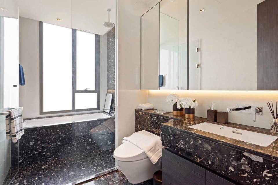 Luxury 2-bedroom condo at BEATNIQ Sukhumvit 32 for sale 21.5M THB. Cheapest unit in the building! High floor, smart home, near BTS. Great investment deal!