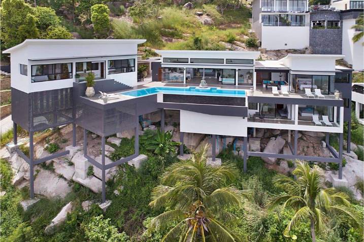 Luxury 4-bed 4.5-bath 882 SQM Villa Coco Koh Samui for sale. Private infinity pool, ocean views, top location in Chaweng Noi. Price 39.75M THB. Contact us now!