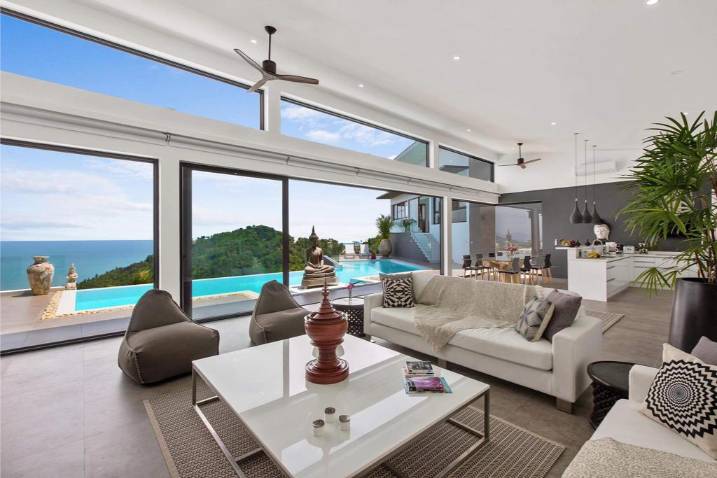 Luxury 4-bed 4.5-bath 882 SQM Villa Coco Koh Samui for sale. Private infinity pool, ocean views, top location in Chaweng Noi. Price 39.75M THB. Contact us now!