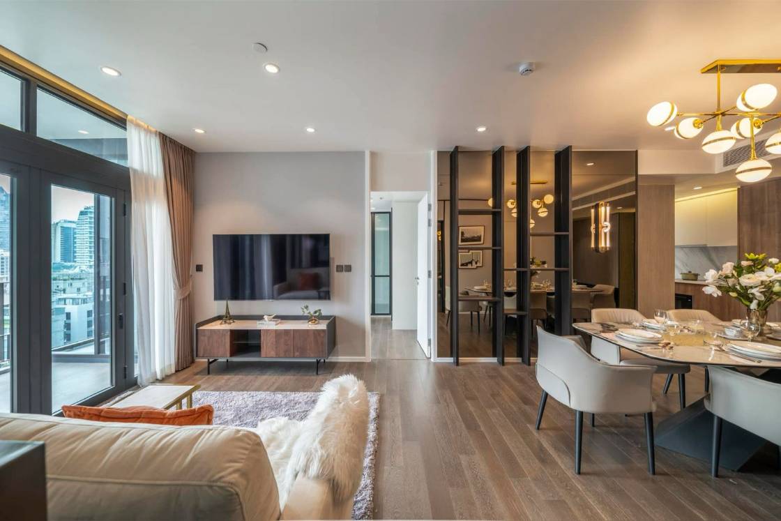 Luxury 2-bedroom condo at MUNIQ Sukhumvit 23, 86 sqm, 12th floor, prime Sukhumvit location. High-end facilities, near BTS Asoke. For rent at 100,000 THB/month.