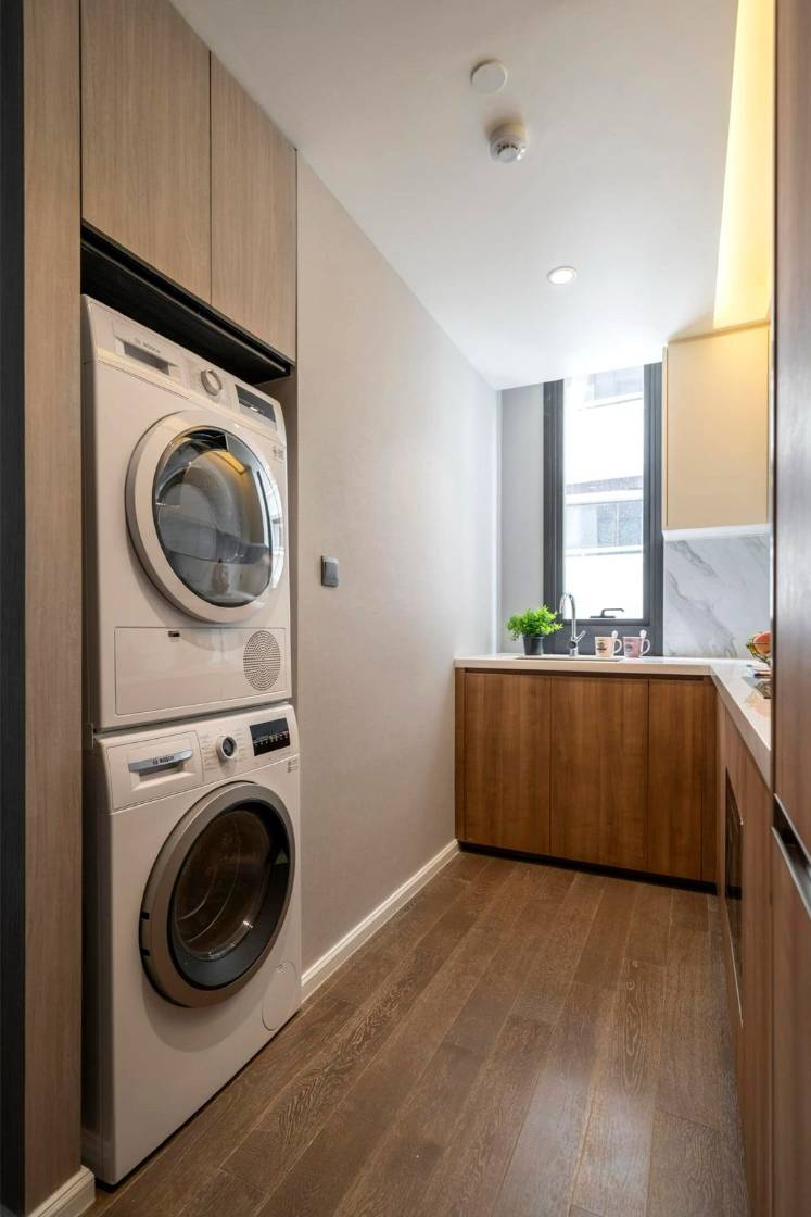 Luxury 2-bedroom condo at MUNIQ Sukhumvit 23, 86 sqm, 12th floor, prime Sukhumvit location. High-end facilities, near BTS Asoke. For rent at 100,000 THB/month.