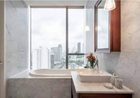 Luxury 2-bed, 2-bath 82 sqm condo at Khun by Yoo, Thonglor. Fully furnished, east-facing, with top-tier amenities. For rent at 120,000 THB/month.