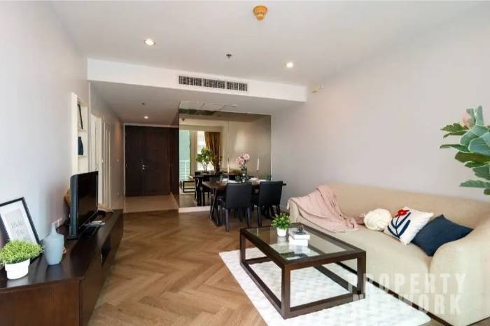 Spacious 1-bed, 1-bath 61 sqm unit on 14th floor at Siri Residence. Features 2 balconies and closed kitchen. For sale at ฿10.5M. Contact us for a viewing today!