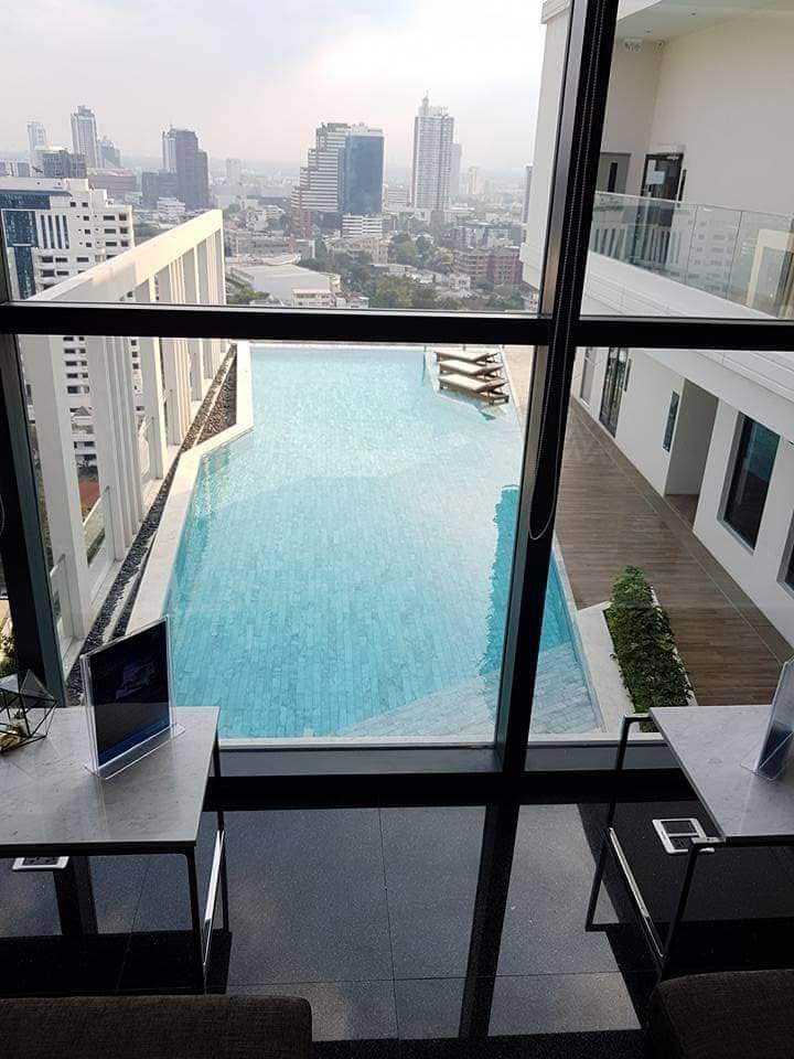 Spacious 2BR 2BA condo at M Thonglor 10, 57.5 sqm, 18th floor, fully furnished, near BTS, pet-friendly, rent 45,000 THB/month, move-in April 2025.