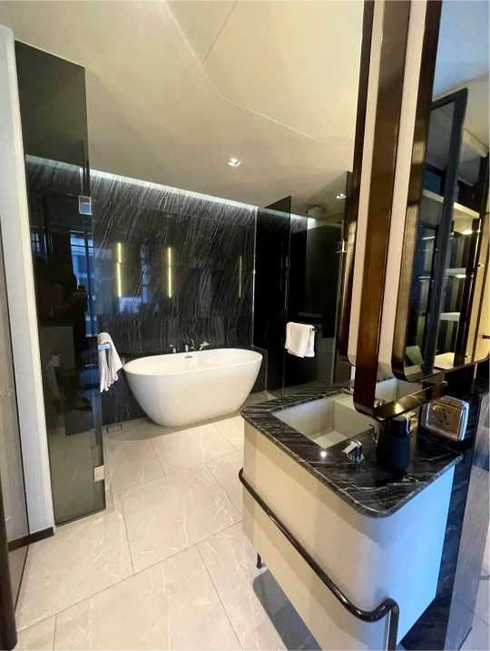 Luxury 2+1BR condo at The Reserve Sukhumvit 61. 122sqm, fully furnished, top amenities. Rent 150,000 THB/month. BTS Ekkamai nearby.